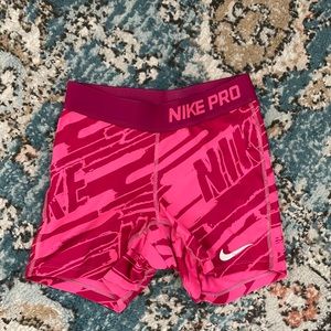 Girls pink Nike pros sliders size medium